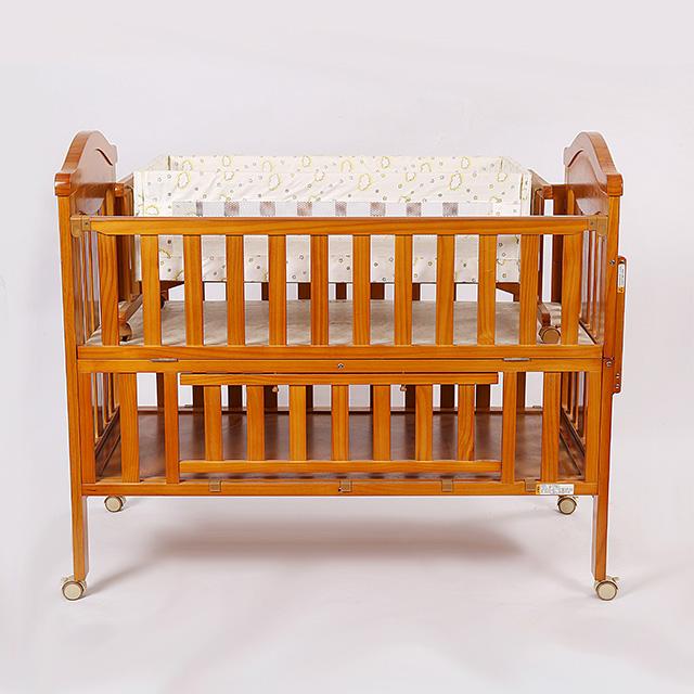 Adjustable Solid Wooden Baby Cot supplier
